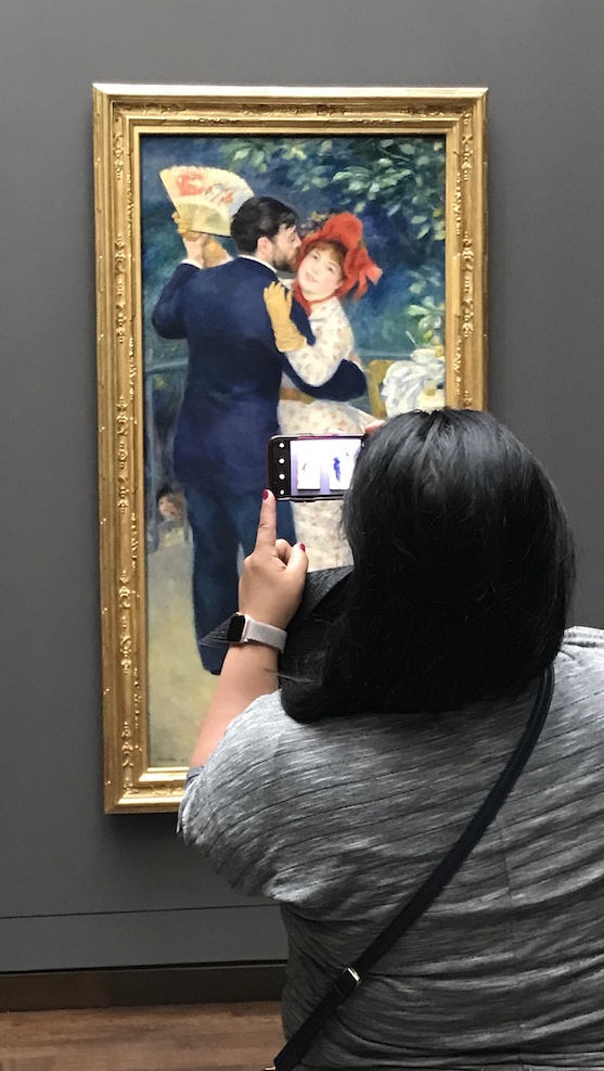 Taking a picture of a painting